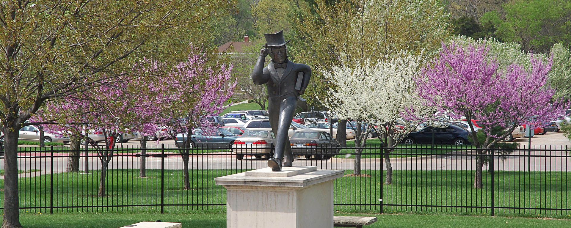 Mr Ichabod statue with spring trees